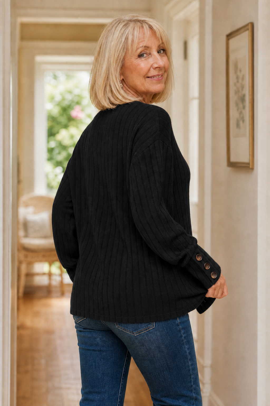 Wilhelmina ribbed V-neck sweater styled with jeans and boots, full length view