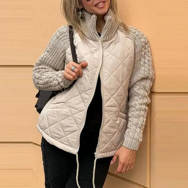 Winslet quilted stand collar jacket with knitted sleeves in cream, front view