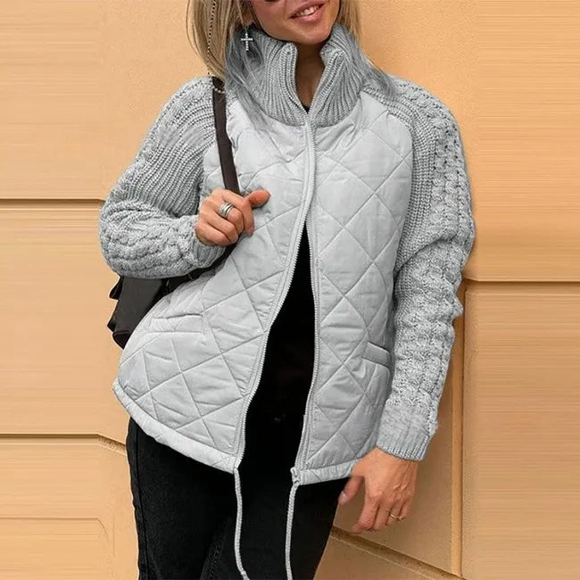 Winslet quilted stand collar jacket with knitted sleeves in grey, front view