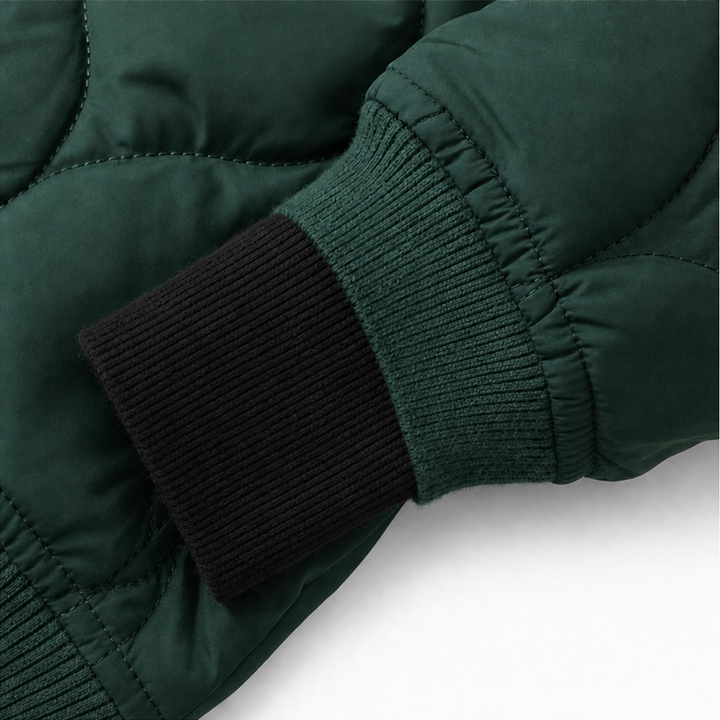 Winter dark green quilted hooded puffer jacket, seated outdoor view