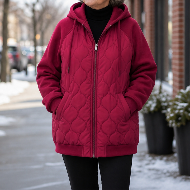 Winter dark green quilted hooded puffer jacket, seated outdoor view