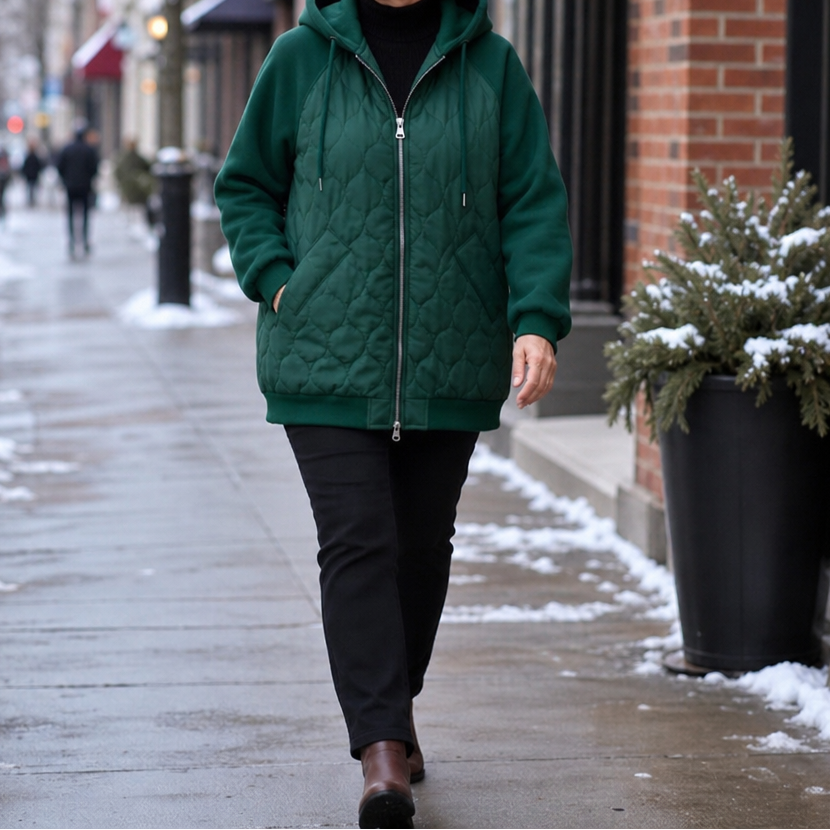 Winter dark green quilted hooded puffer jacket, full-length walking view