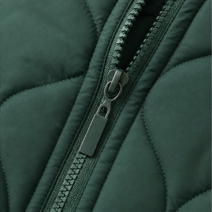 Winter dark green quilted hooded puffer jacket, seated outdoor view