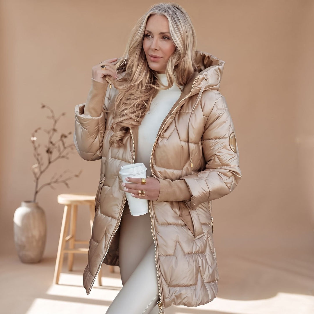 Odette belted hooded puffer coat in beige, close-up side view with hood and sleeve detail