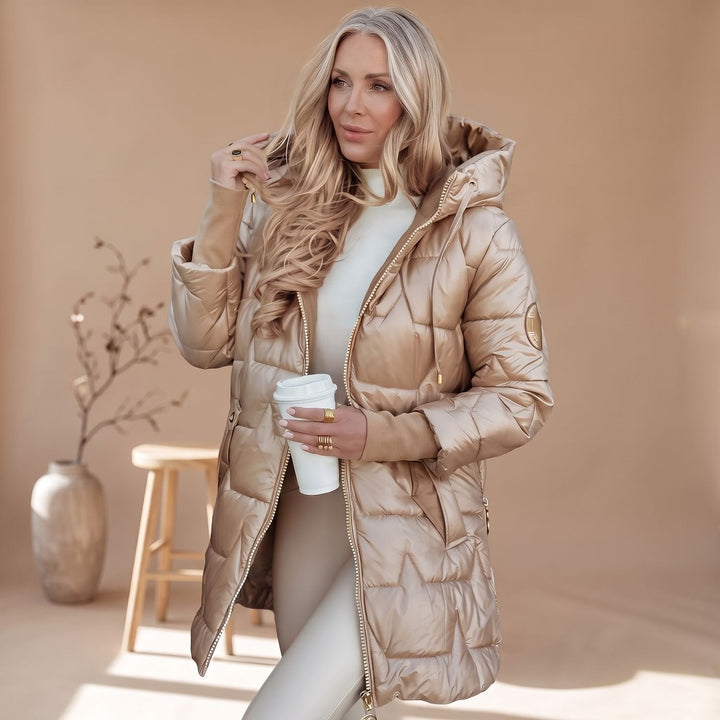 Odette belted hooded puffer coat in beige, close-up side view with hood and sleeve detail