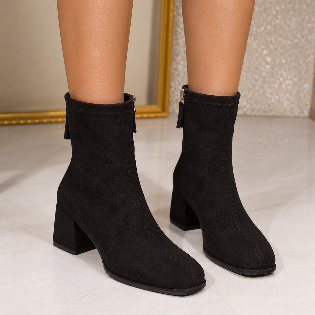 Marigold square toe ankle boots, front view on model
