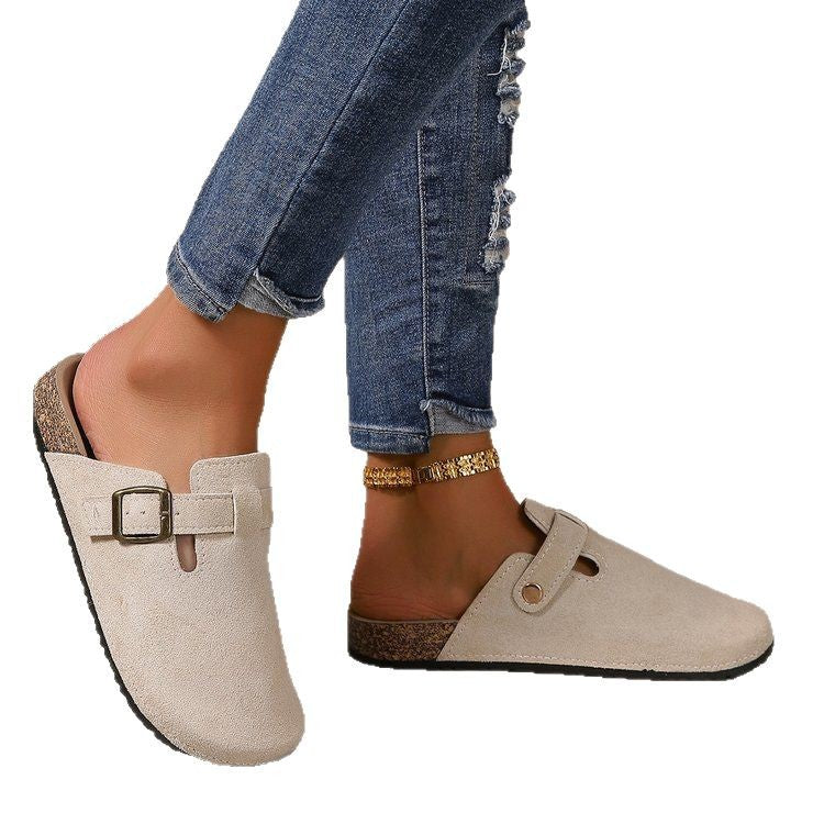 Delphine buckle clogs worn on model, close-up detail