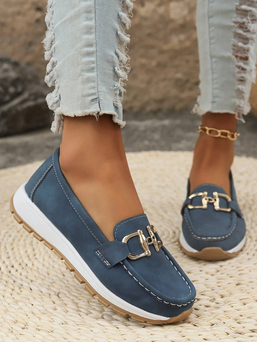 Odette loafers with ankle bracelet, lifestyle detail shot