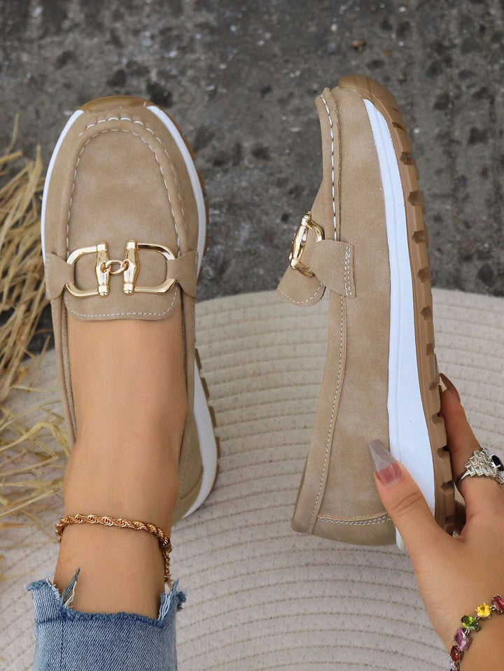 Odette loafers with ankle bracelet, lifestyle detail shot