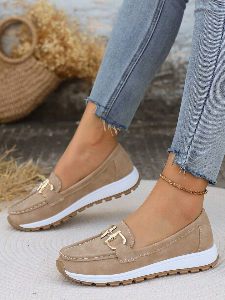 Odette loafers with ankle bracelet, lifestyle detail shot