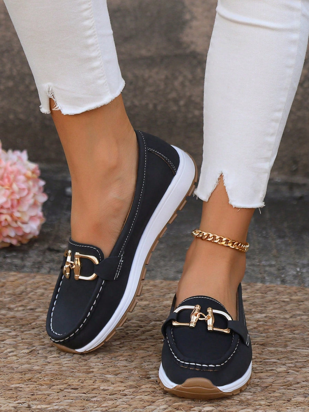 Odette loafers with ankle bracelet, lifestyle detail shot