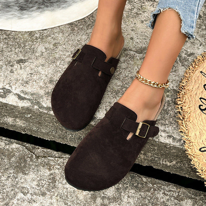 Seraphina buckle strap platform clogs in dark brown, worn on foot top view