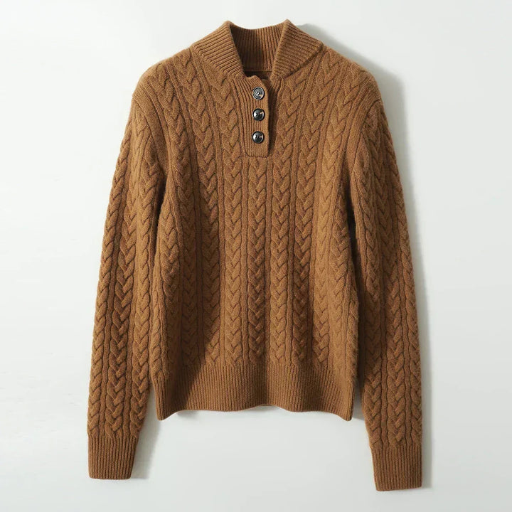 Marigold cable-knit button-up sweater styled with earrings, close-up