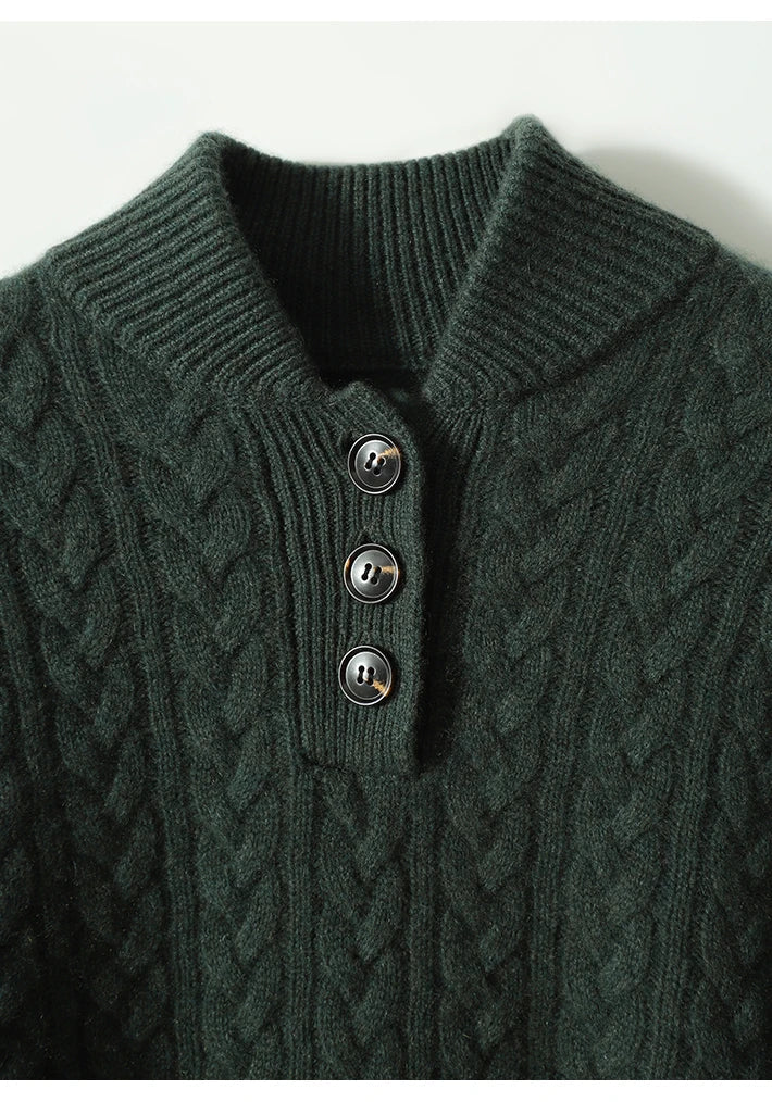 Marigold cable-knit button-up sweater styled with earrings, close-up