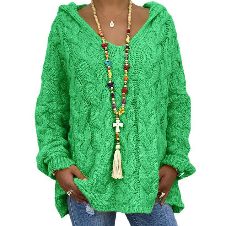 Halona green cable knit hooded sweater, front view with beaded necklace