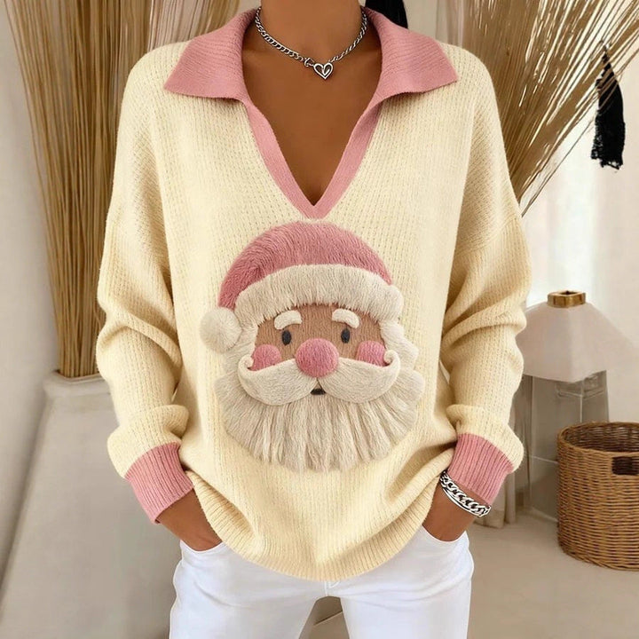 Philippa cream Christmas sweater with pink collar and Santa graphic, front view close-up