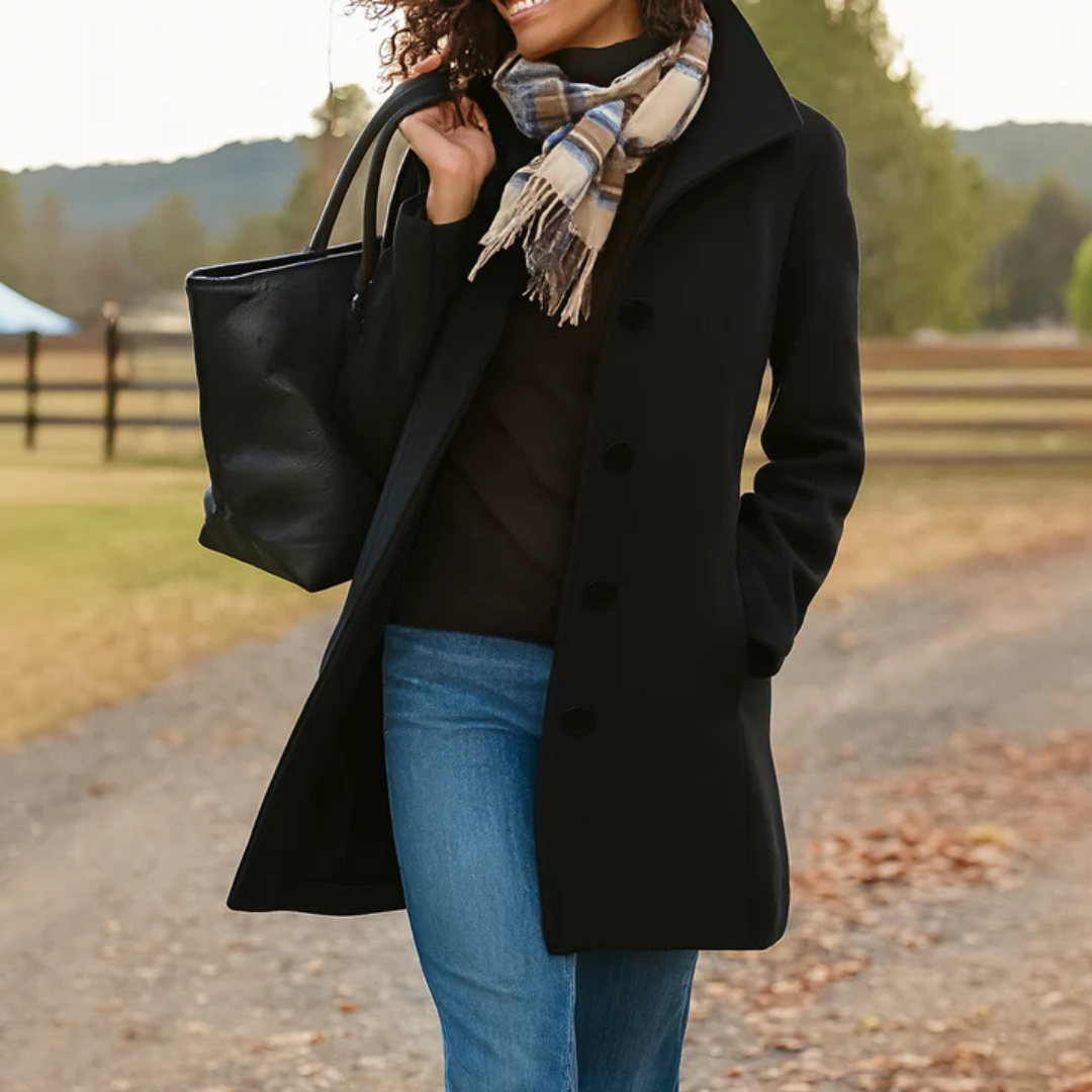 Vivienne coat in black, close-up front view with scarf