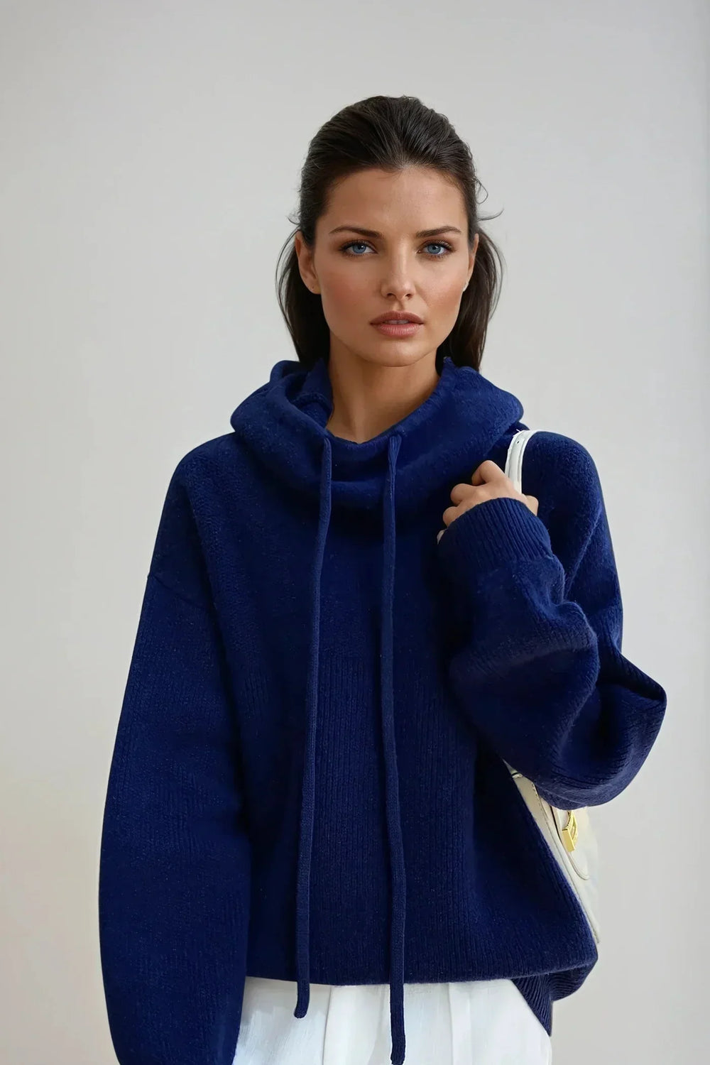 Larkspur cowl turtleneck sweater in navy blue, front view