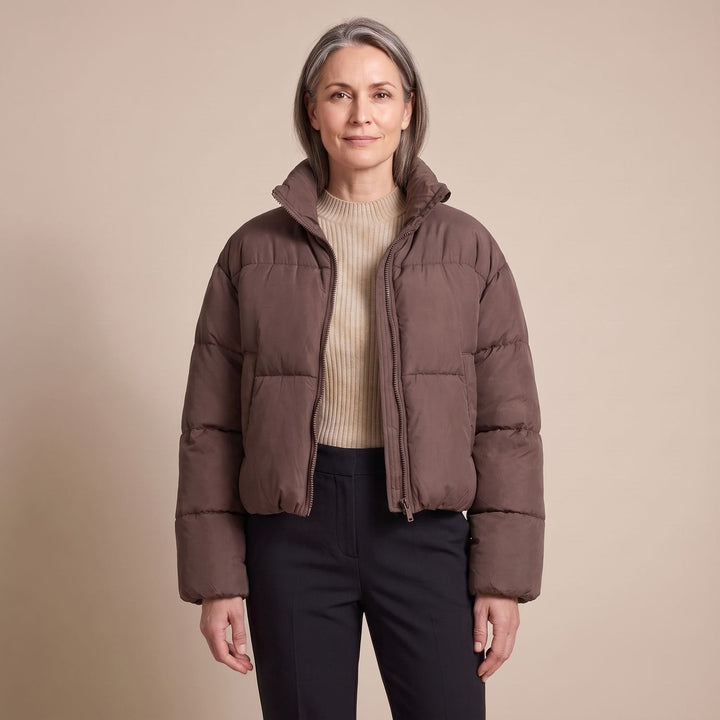 Odalys cropped puffer jacket in black, full outfit view on model