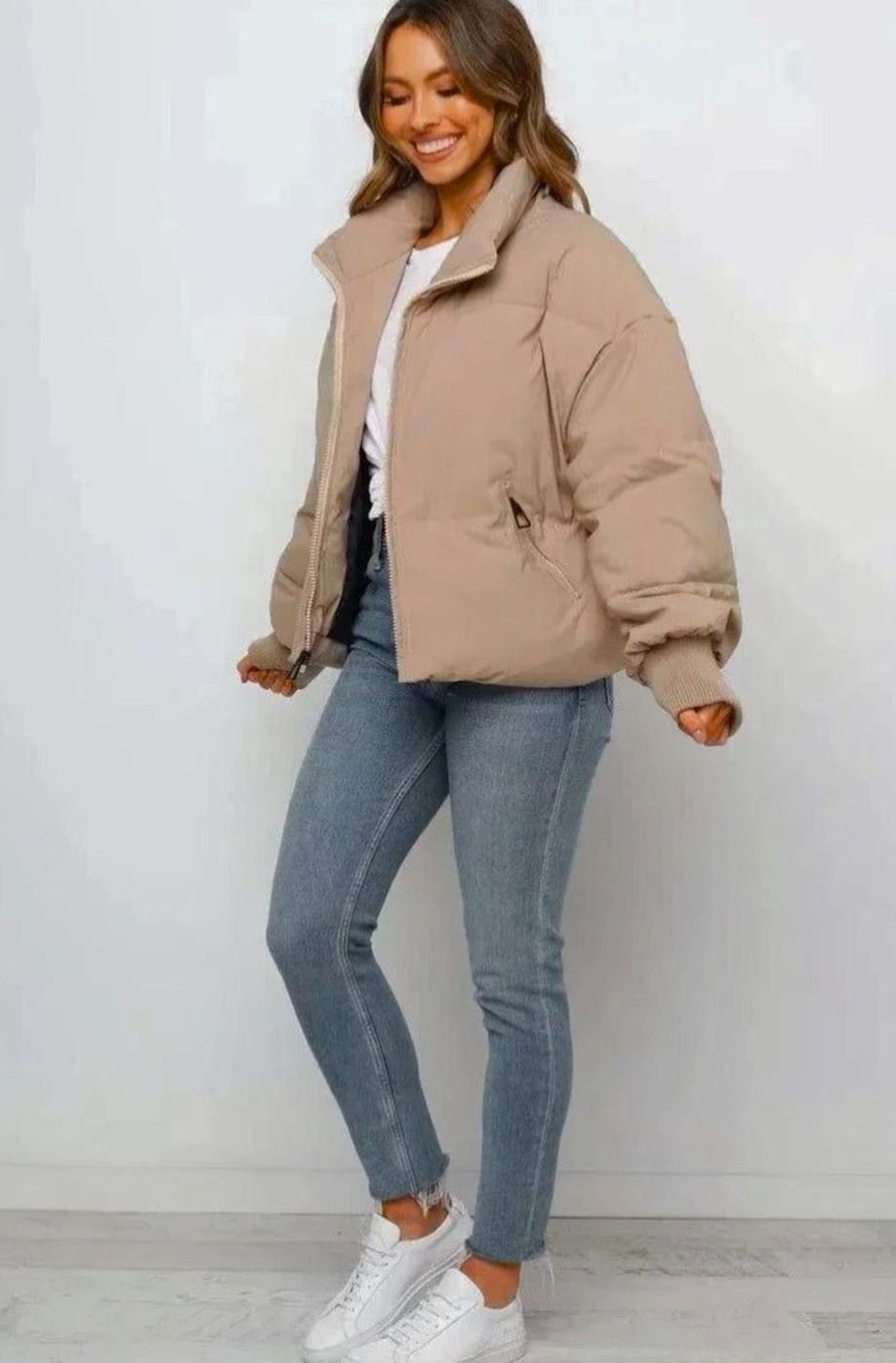 Imogen cropped puffer jacket styled open over white tee and jeans