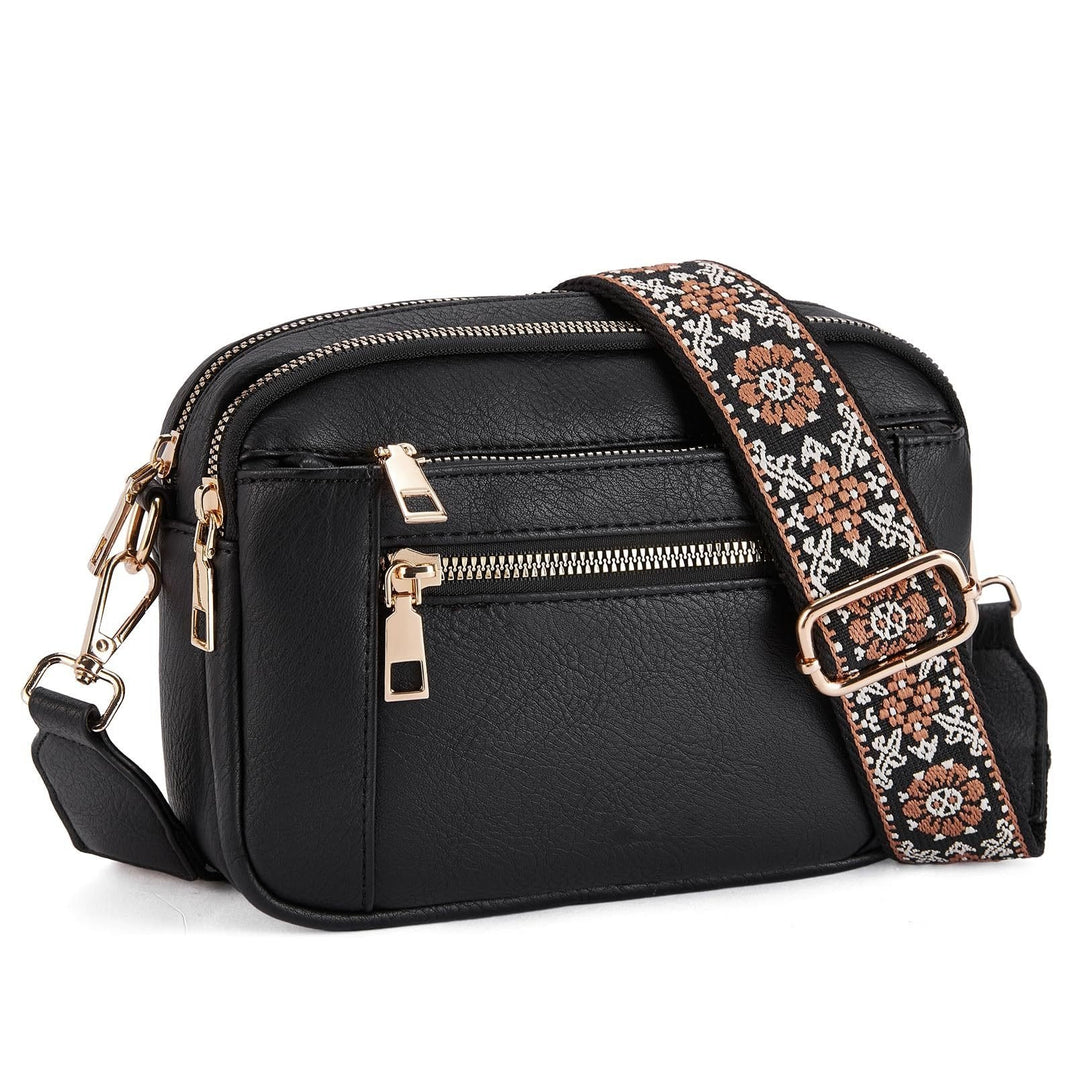 Woman carrying Marisol crossbody bag on shoulder, side view