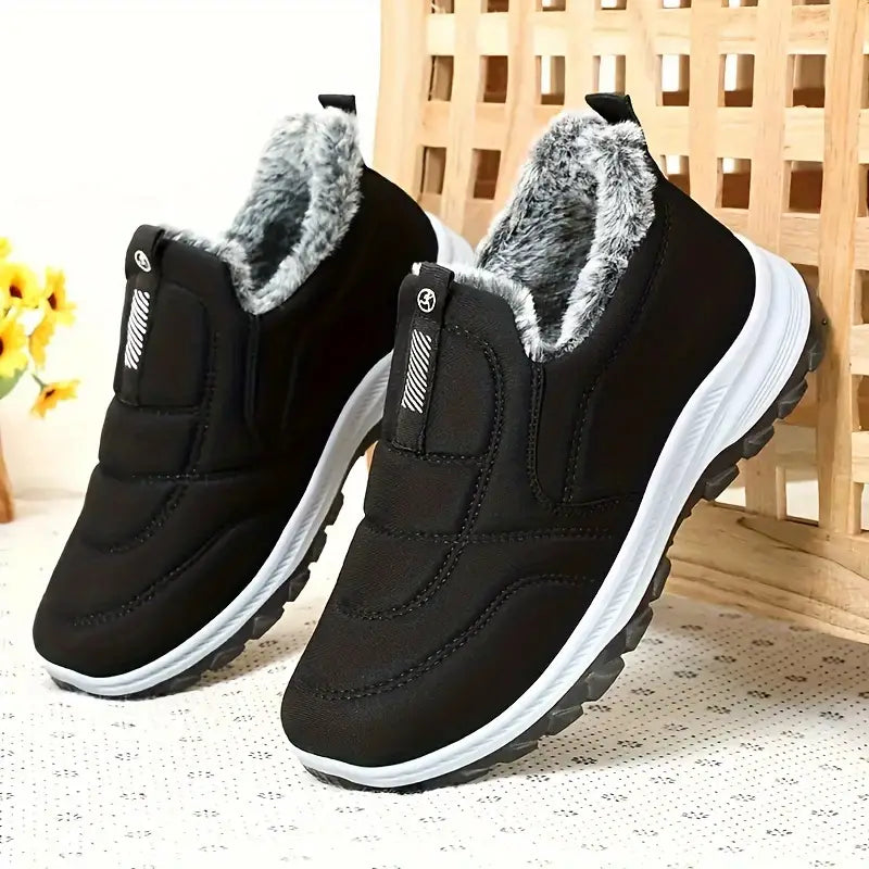 Rosalyn black fleece-lined platform snow boots, side angled view