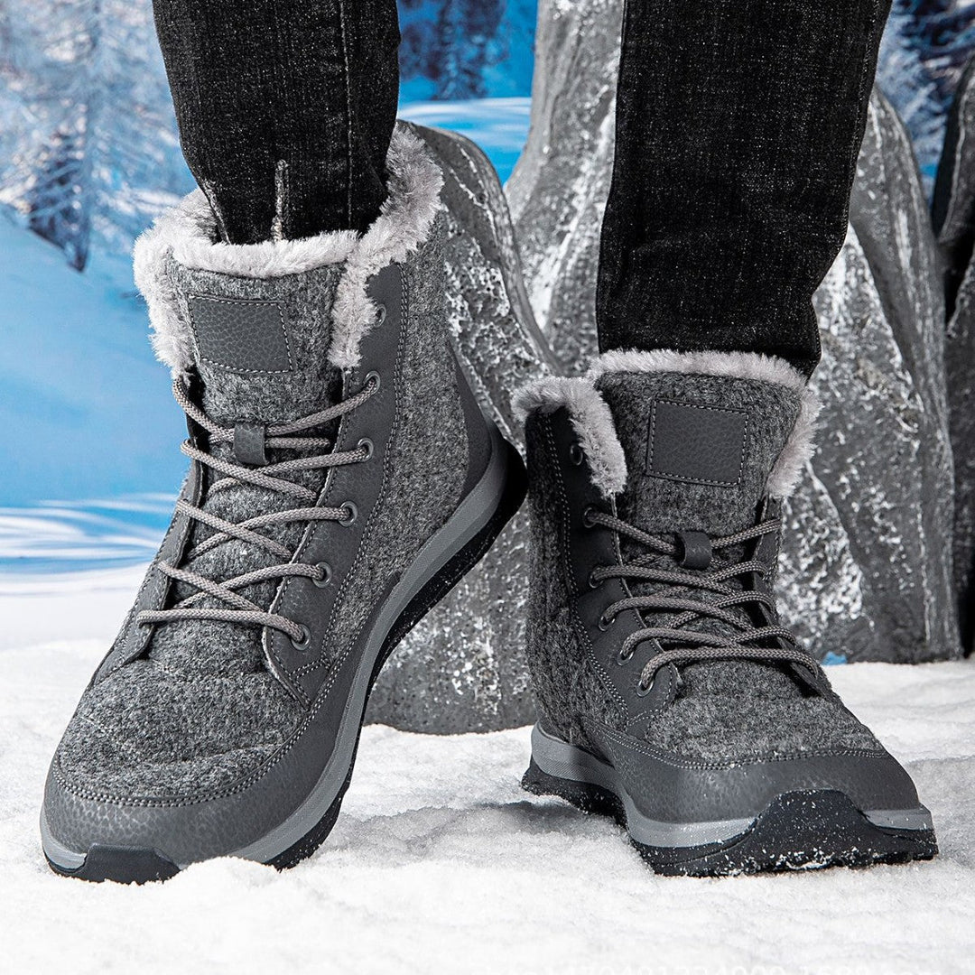 Marguerite fleece lined snow boots worn with jeans, close-up on snow