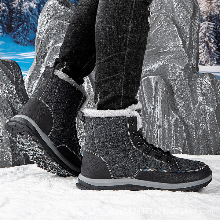 Marguerite fleece lined snow boots on feet, side view against rocky winter backdrop