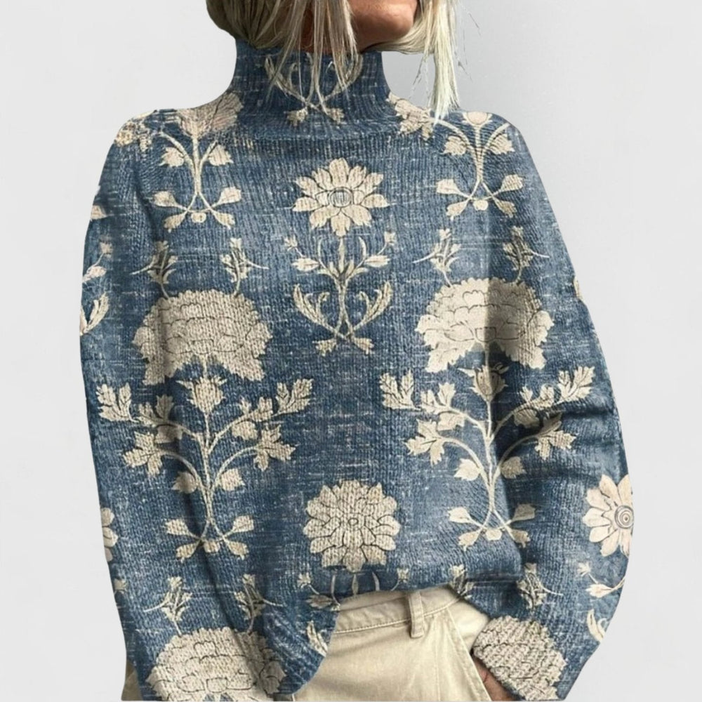 Delphine floral print turtleneck knit sweater in blue with cream floral pattern, front view