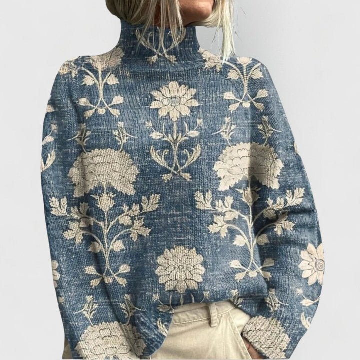 Delphine floral print turtleneck knit sweater in blue with cream floral pattern, front view