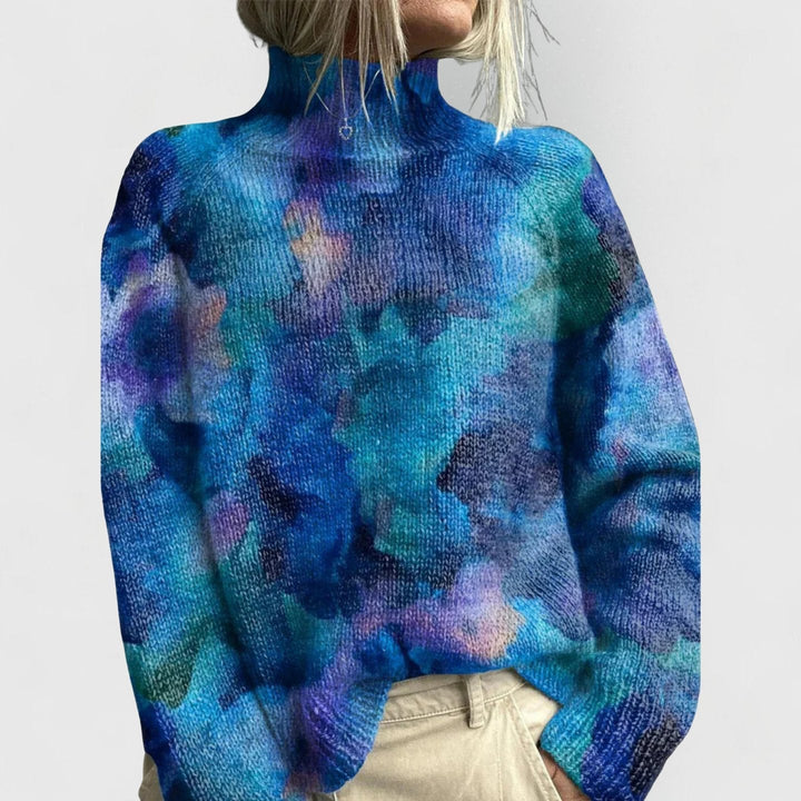 Delphine floral print turtleneck knit sweater in watercolor blue tie-dye pattern, back view