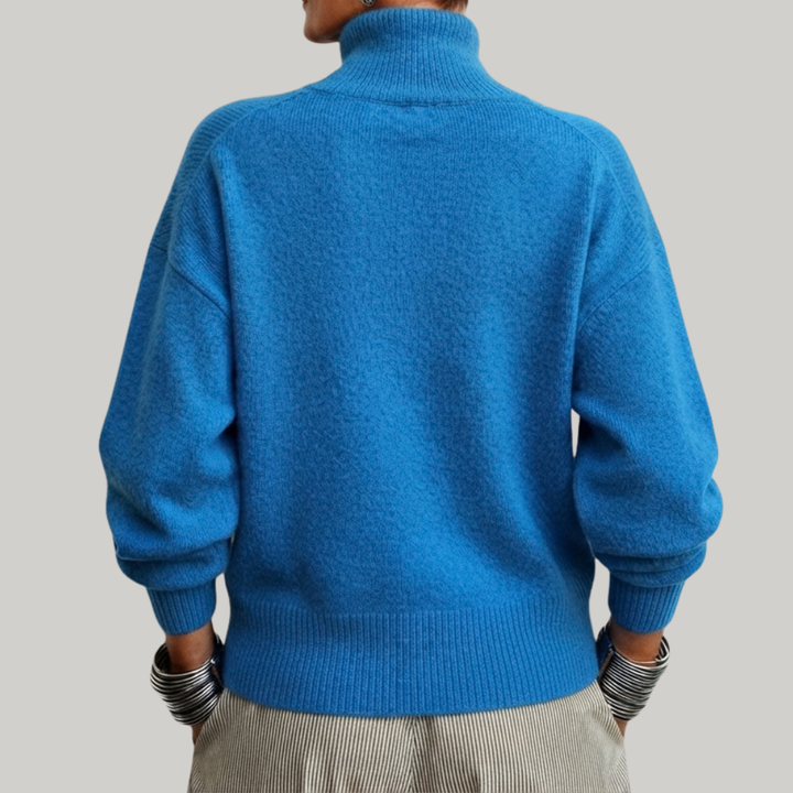 Thea high neck button detail sweater in blue, front view