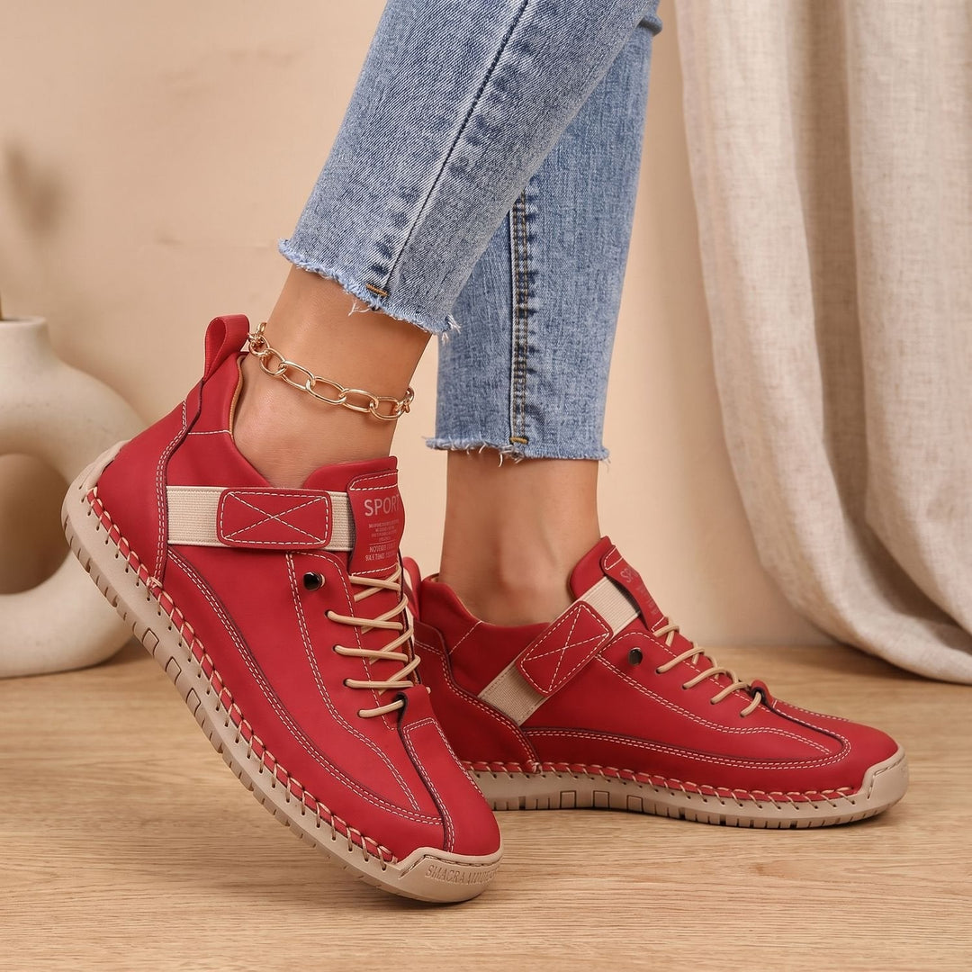 Rosalind high-top lace-up sneakers in green, side view on model