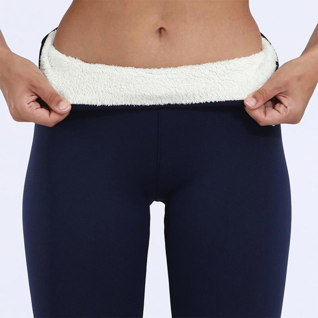 Close-up of fleece lined ankle cuffs on black leggings