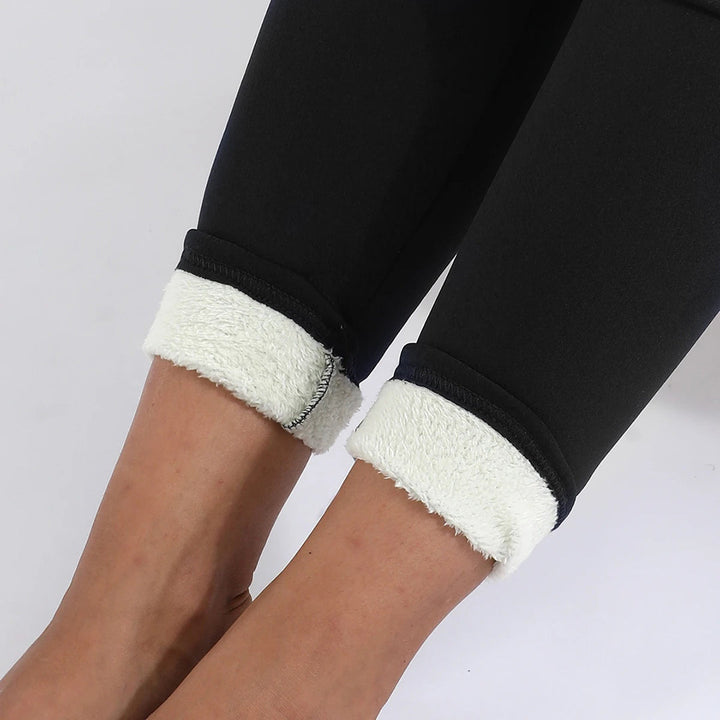 Close-up of fleece lined ankle cuffs on black leggings