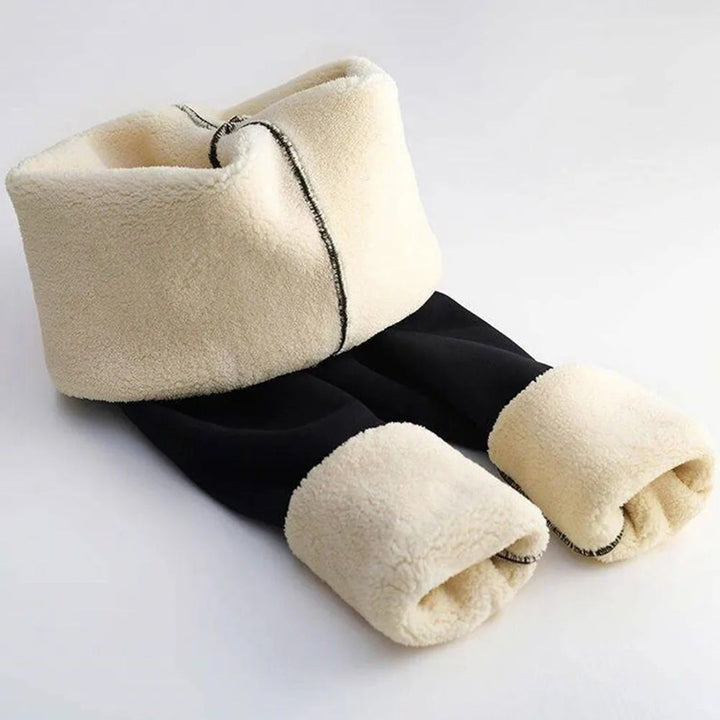 Close-up of fleece lined ankle cuffs on black leggings