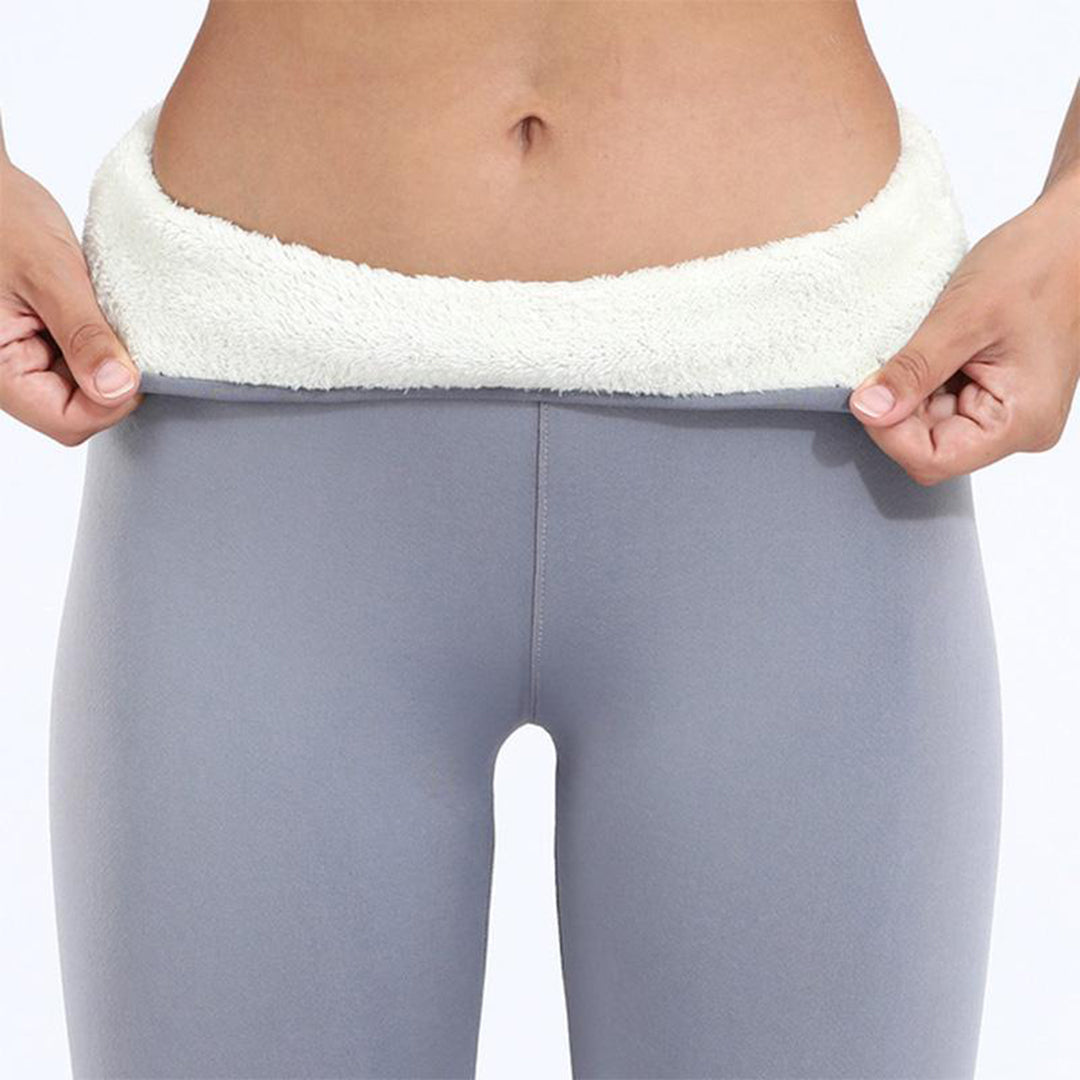 Close-up of fleece lined ankle cuffs on black leggings