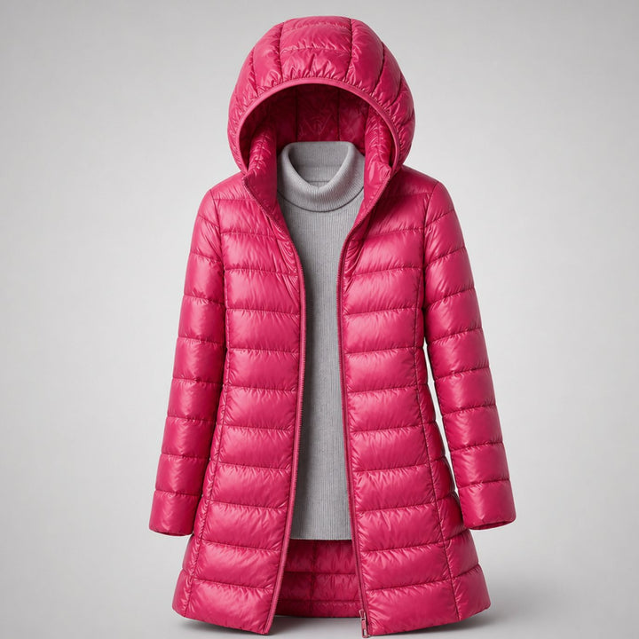 Wilhelmina long puffer jacket in neutral tone with hood, styled with handbag