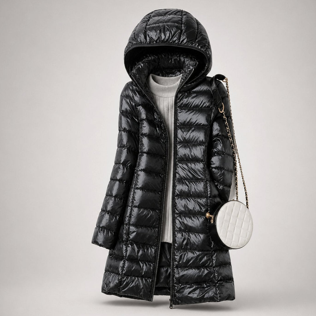 Wilhelmina long puffer jacket in neutral tone with hood, styled with handbag
