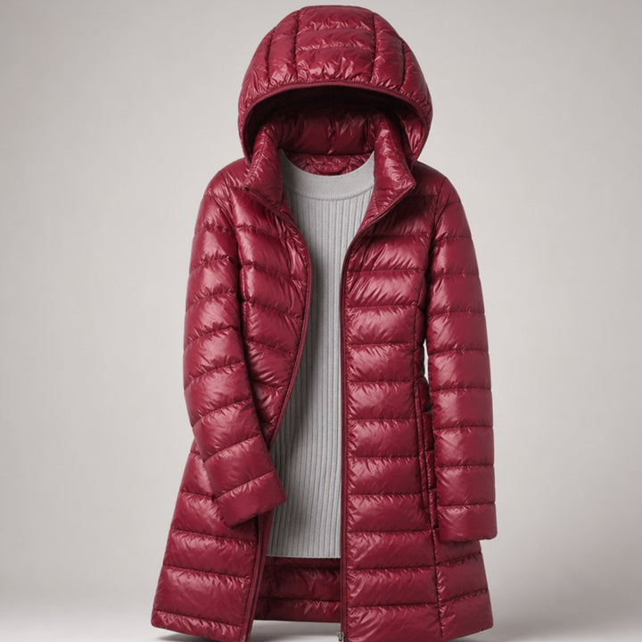 Wilhelmina long puffer jacket in neutral tone with hood, styled with handbag