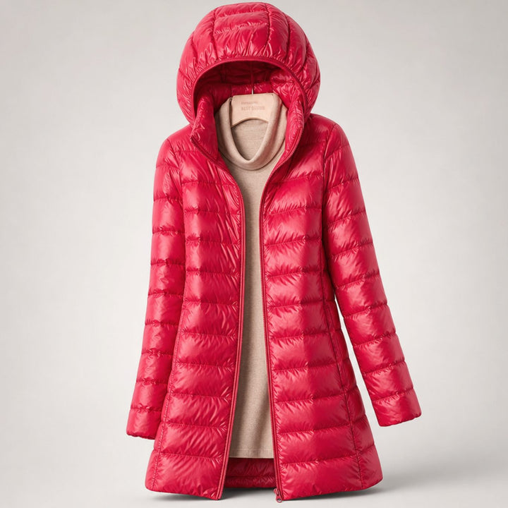 Wilhelmina long puffer jacket in neutral tone with hood, styled with handbag