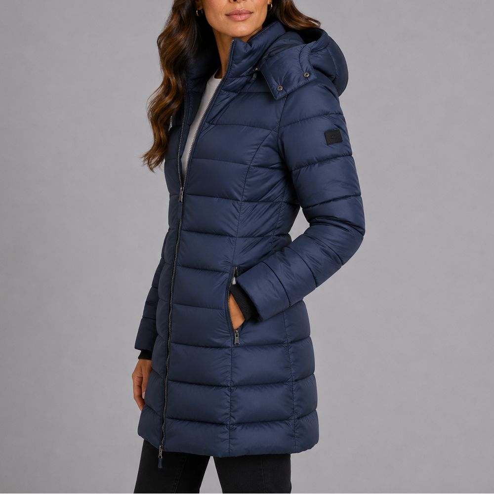 Winona navy hooded puffer jacket, side view showing fitted silhouette
