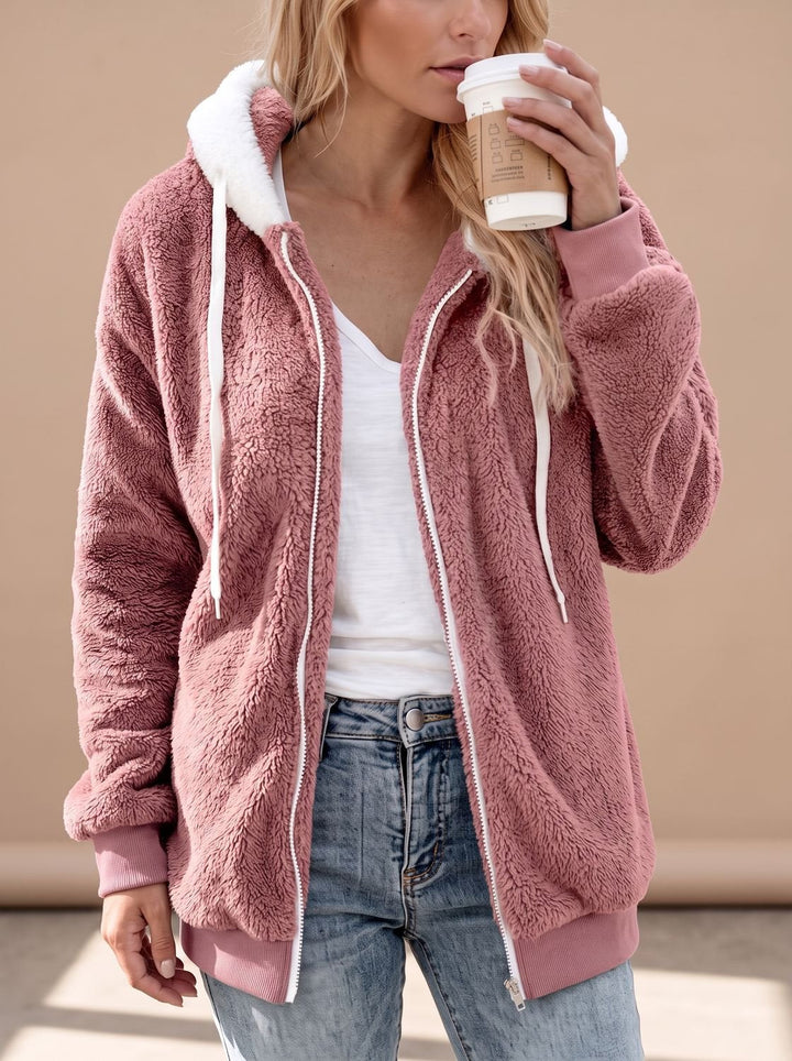 Rosamund hooded longline sherpa jacket in lilac, front view with side pockets