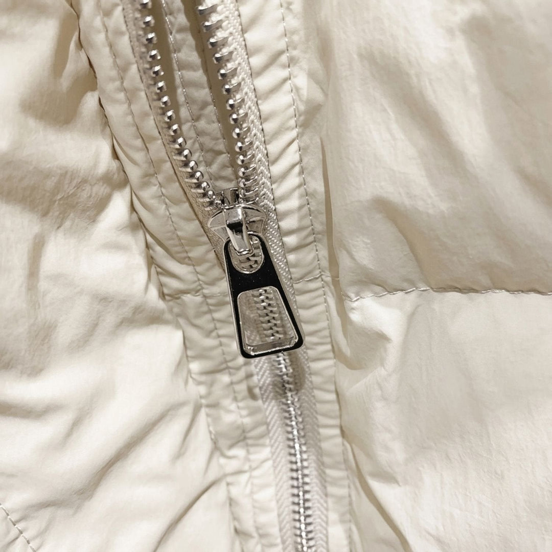 Close-up of Marisabel puffer jacket hood and collar detail