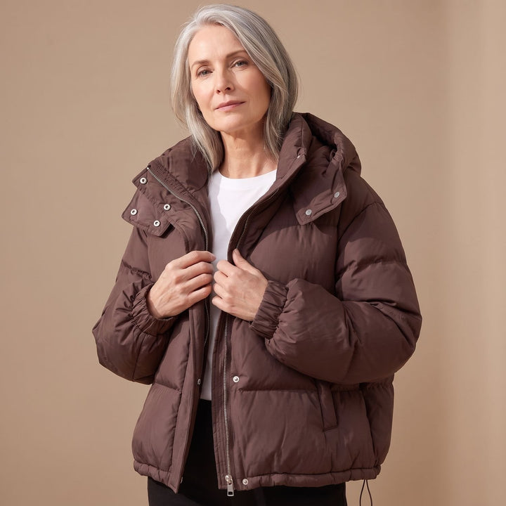Close-up of Marisabel puffer jacket hood and collar detail