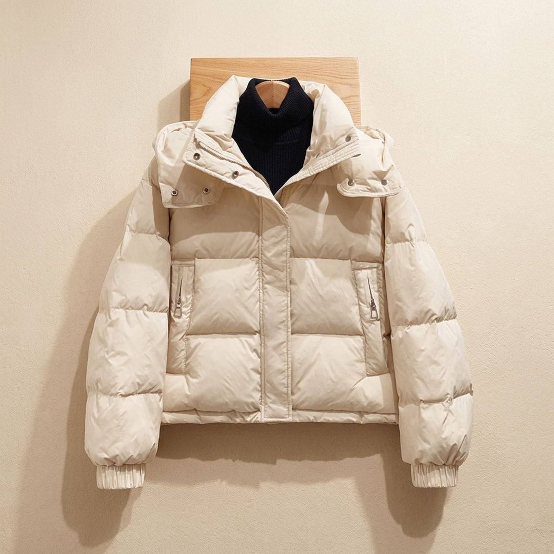 Marisabel puffer jacket displayed flat with hood and zip pockets