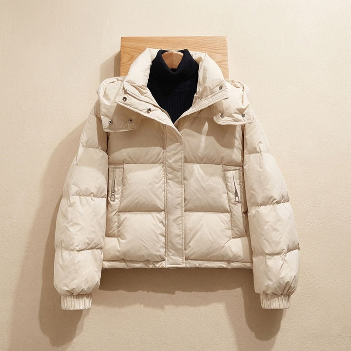 Marisabel puffer jacket displayed flat with hood and zip pockets