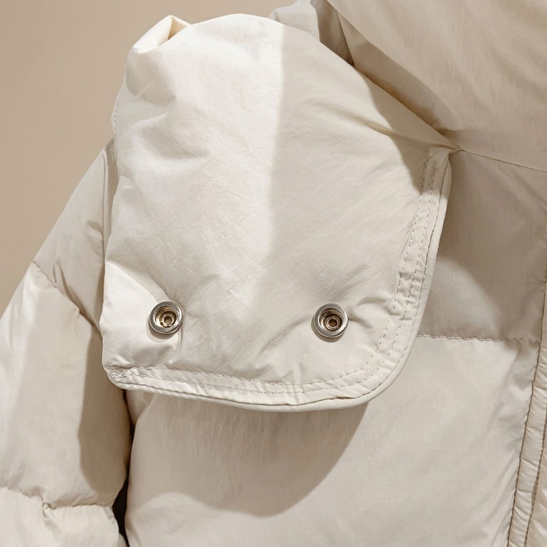 Close-up of Marisabel puffer jacket hood and collar detail