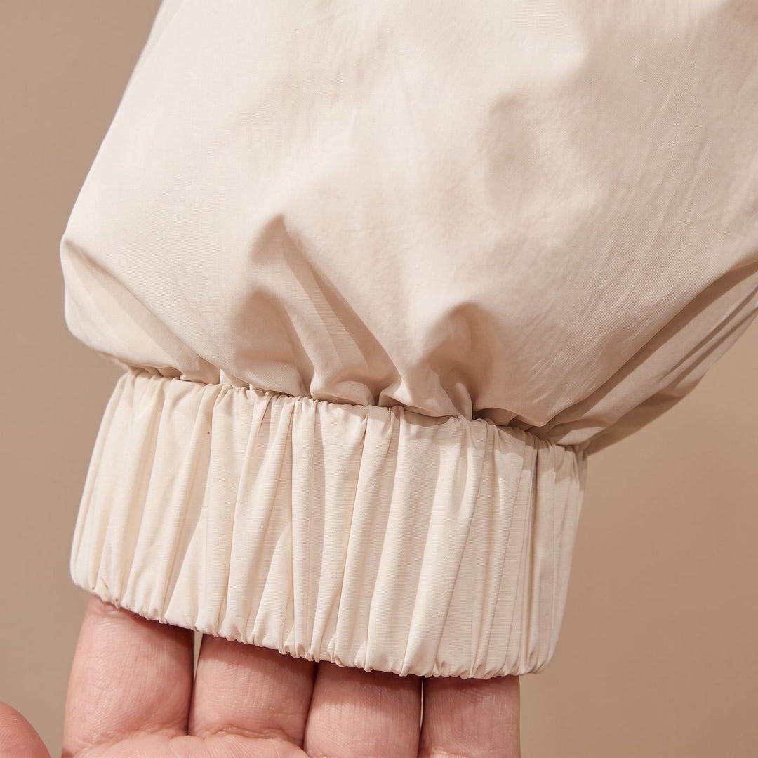 Close-up of Marisabel puffer jacket hood and collar detail