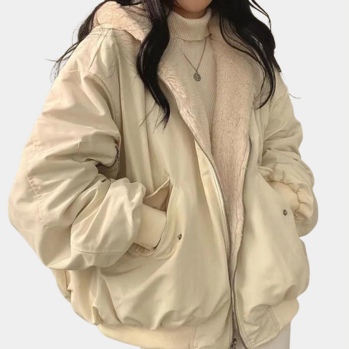 Noelani hooded oversized winter jacket in cream, front view with hands in pockets
